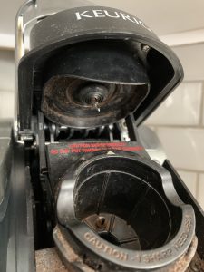 dirty keurig pod chamber that needs cleaning