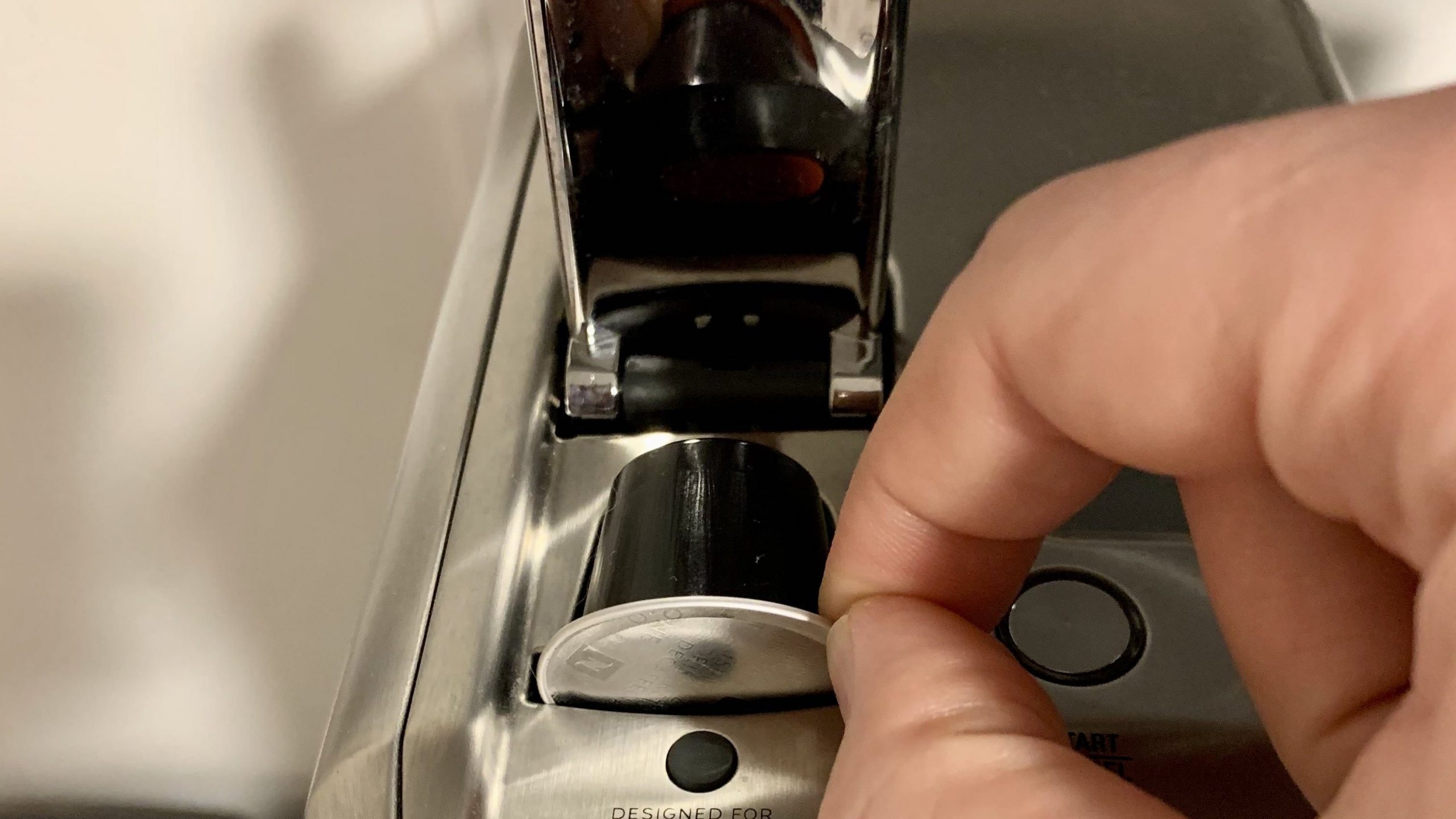 If your Nespresso Original machine is not piercing capsules, make sure pods are inserted correctly with foil lid facing you