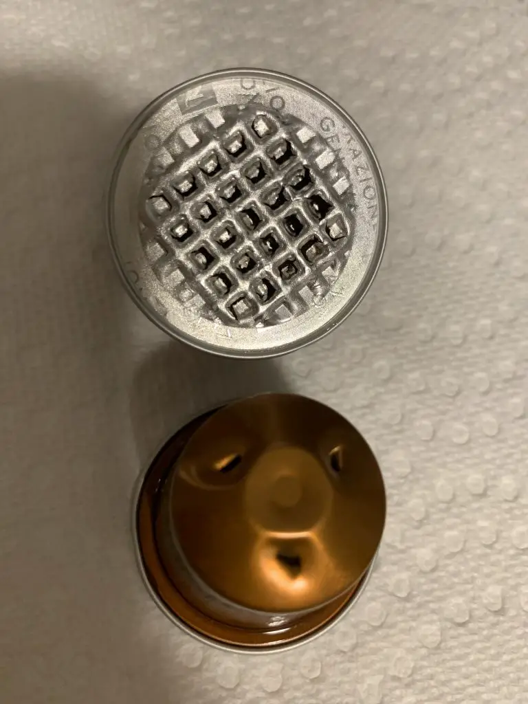 Nespresso Original pod is punctured on the bottom and the seal is broken on the top